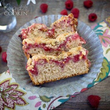 An overhead picture of three raspberry coffee cake slices.