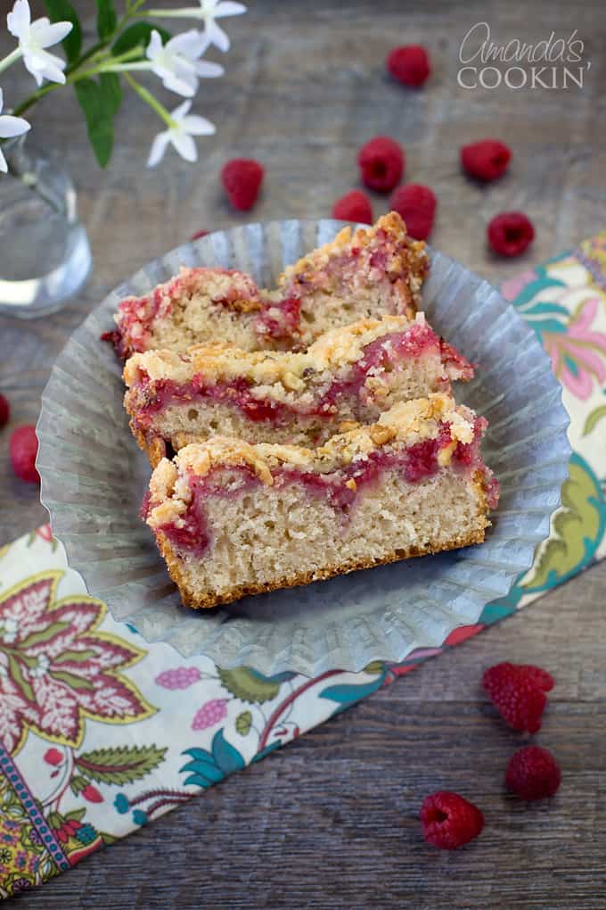 An overhead picture of three raspberry coffee cake slices.