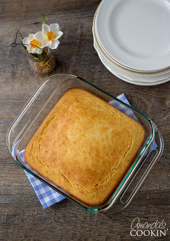 pan of cornbread on blue checkered towel