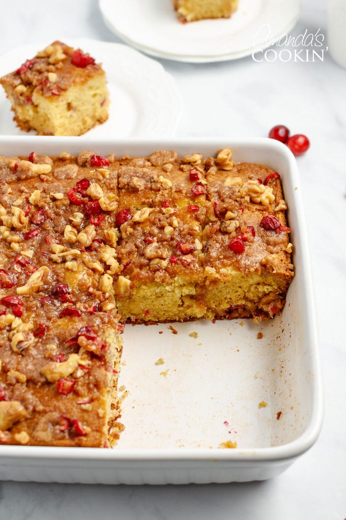 pan of cranberry coffee cake with pieces removed