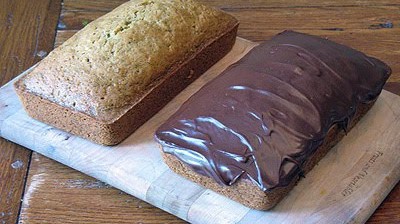 A photo of two loaves of morning glory zucchini bread.