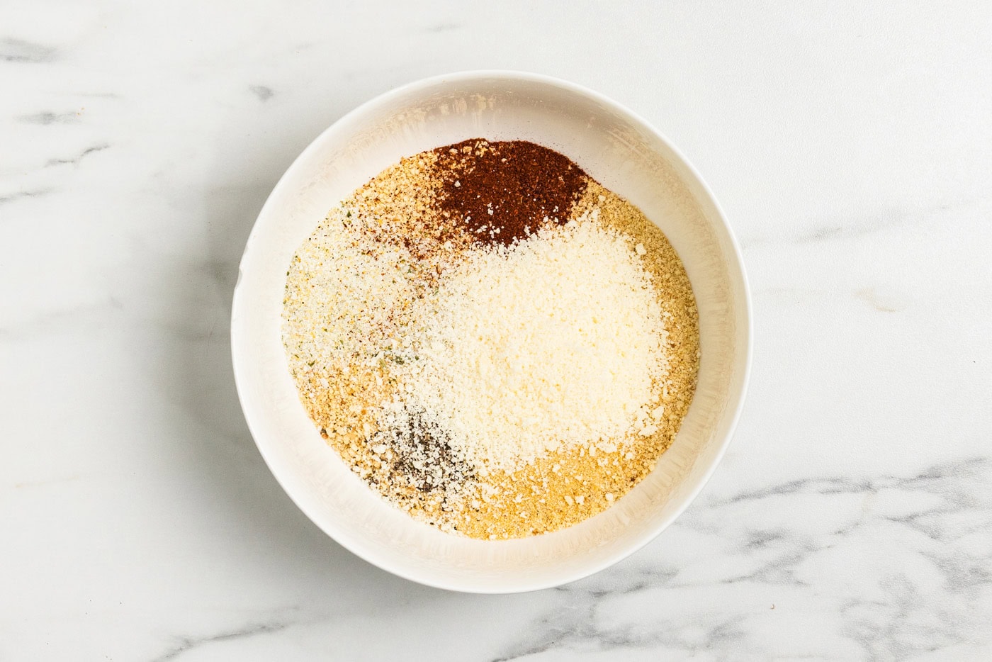 bread crumbs and other dry ingredients in bowl