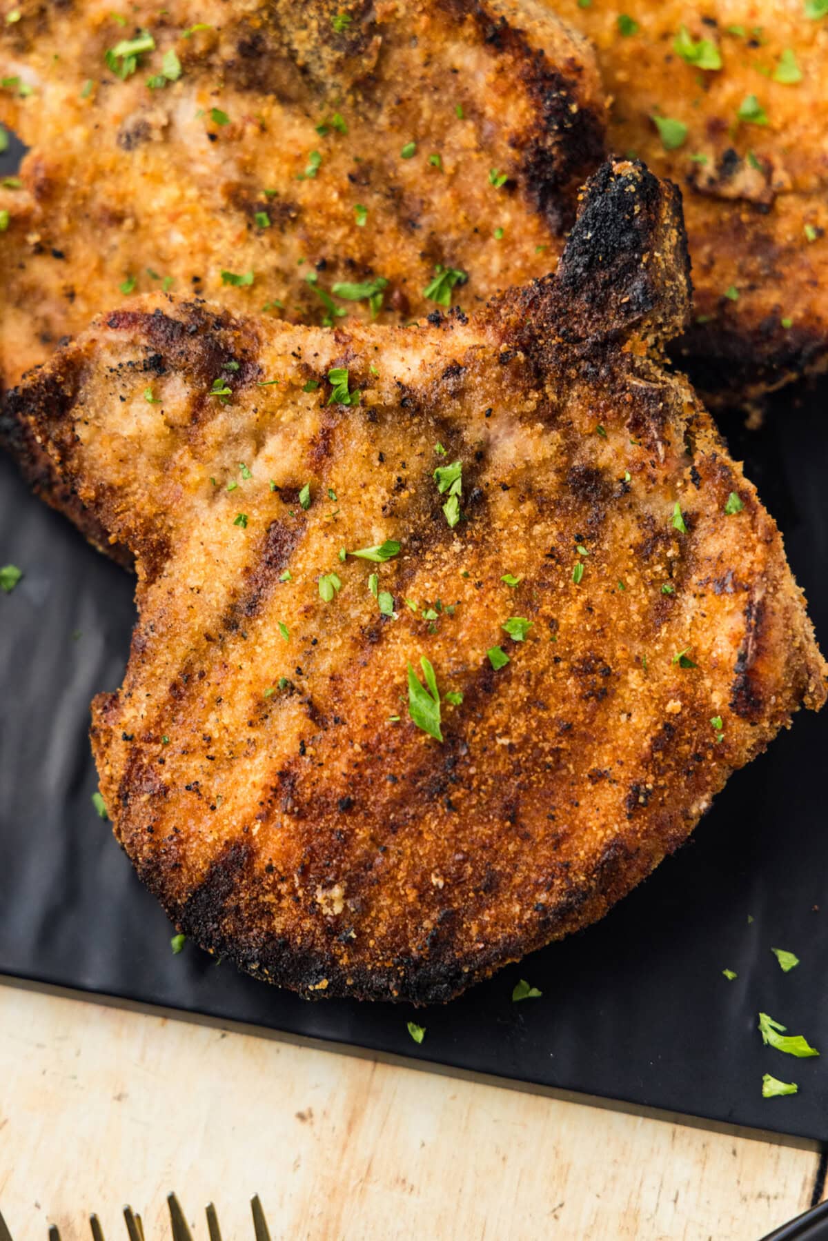 Grilled Breaded Pork Chops on platter