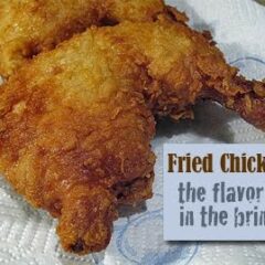 A close up photo of a piece of crispy fried chicken.