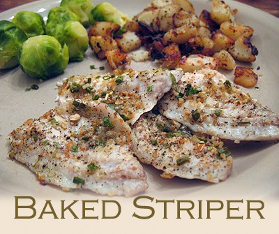 A close up photo of baked striper on a plate with brussels sprouts in the background.