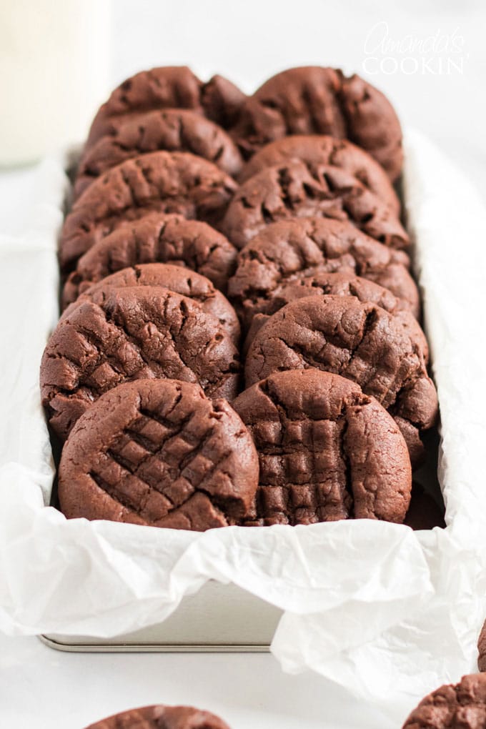box filled with rows of chocolate peanut butter cookies