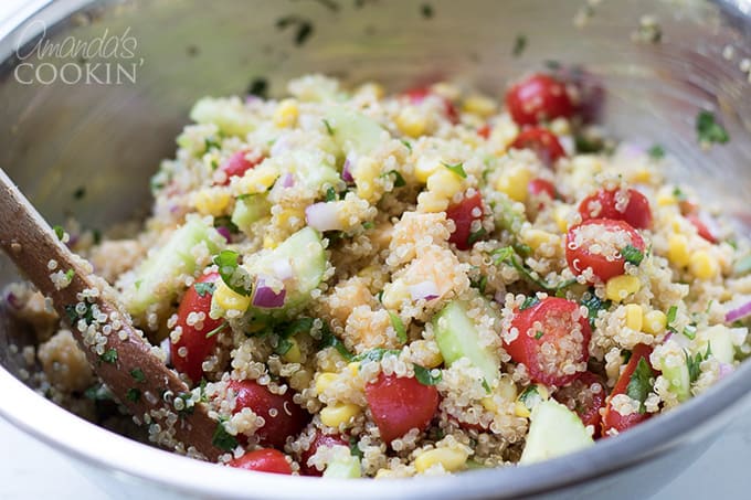 Toss in the quinoa and combine- summer vegetable quinoa salad.
