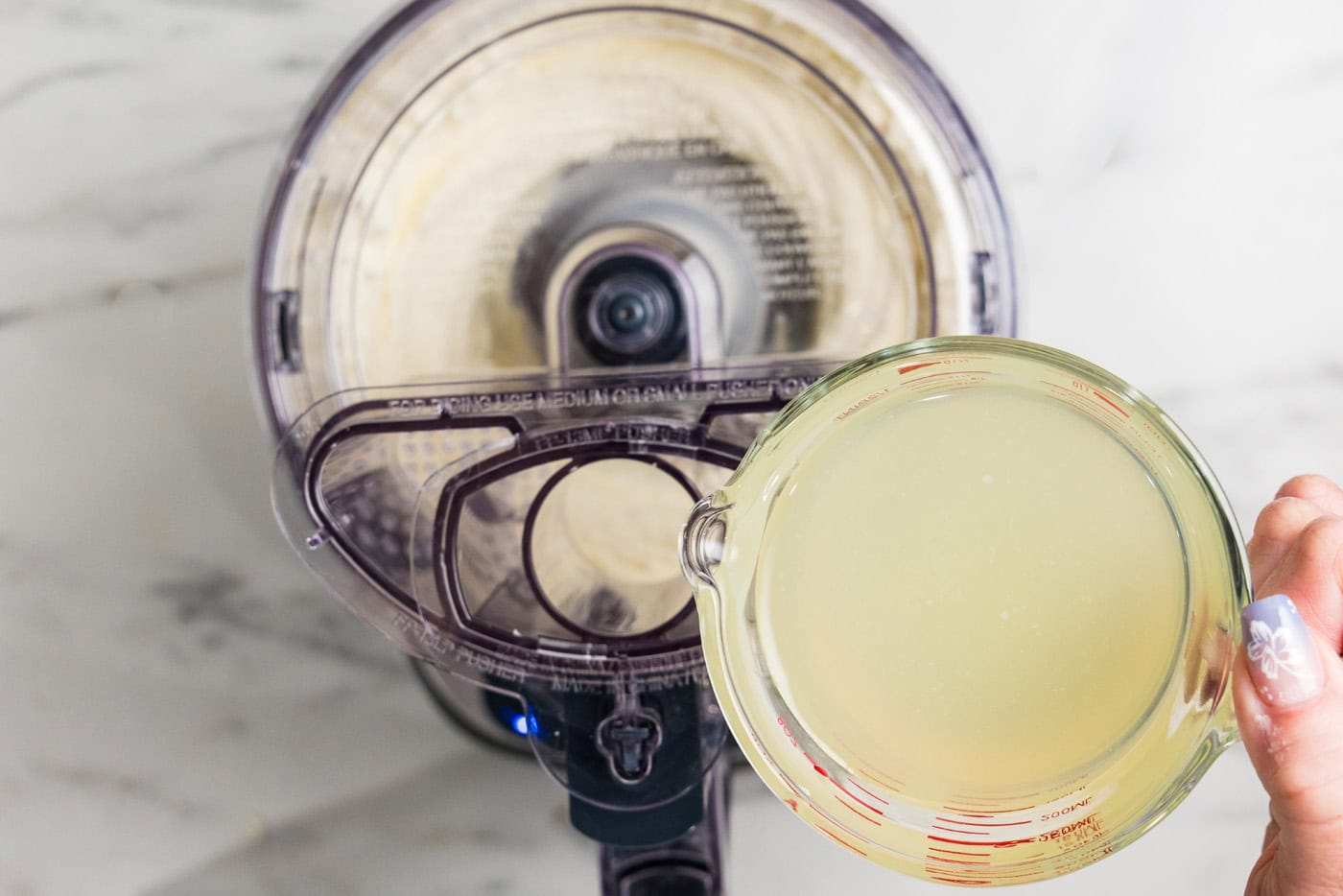 adding lemonade concentrate to food processor