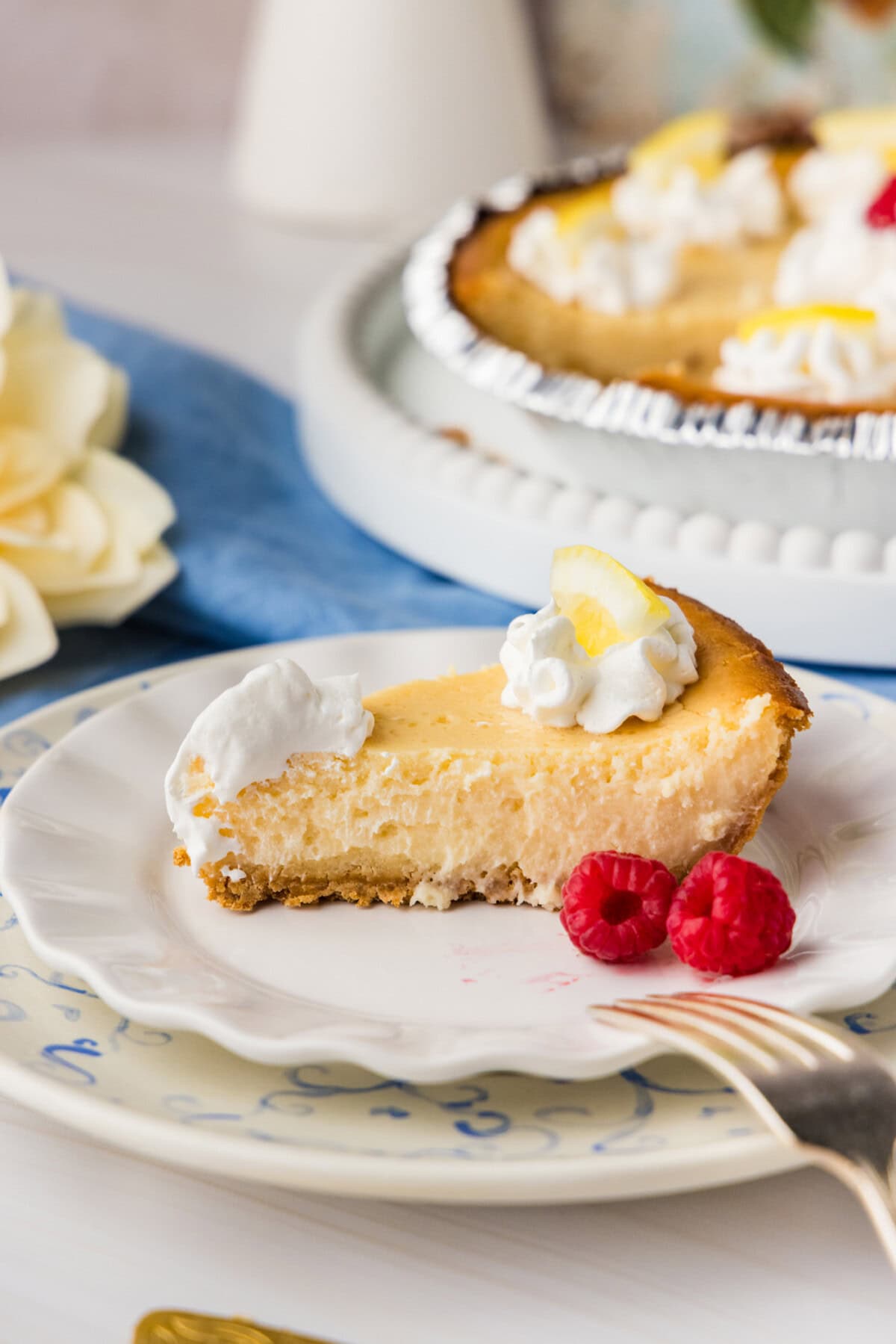 slic of Lemonade Cheesecake on plate