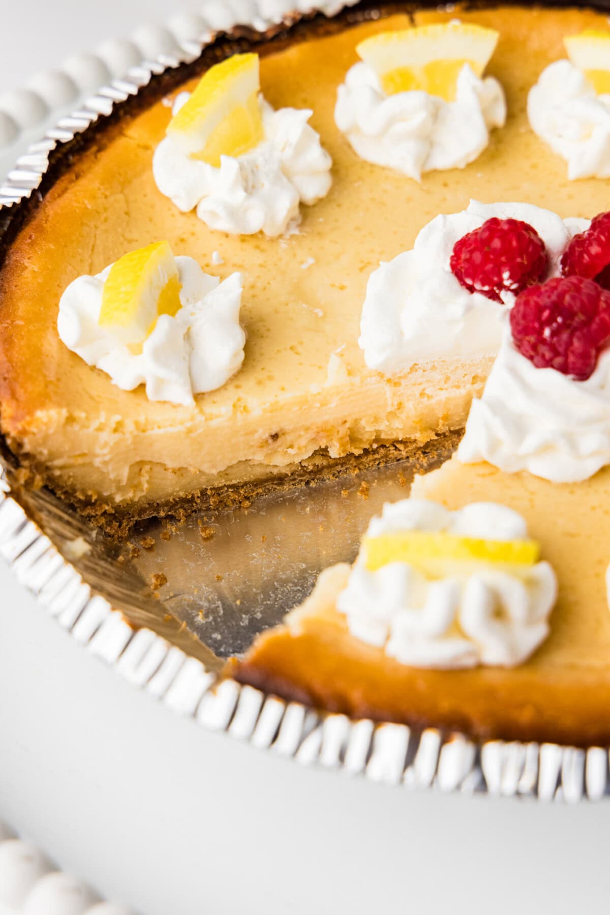 Lemonade Cheesecake with a slice removed