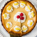Lemonade Cheesecake with spatula lifting a slice