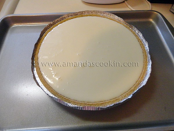 A photo of an unbaked lemonade cheesecake.