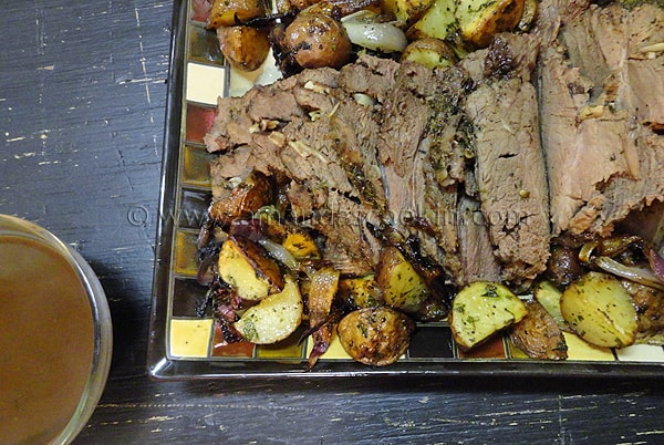 An overhead photo of a serving of perfect Sunday roast on a plate.