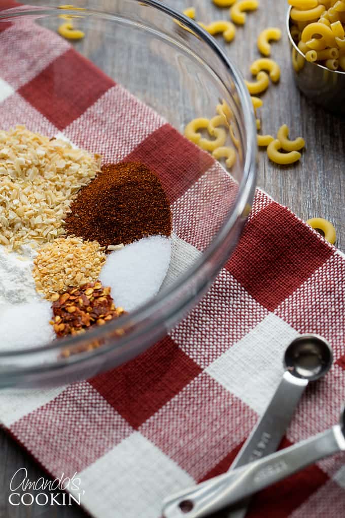 bowl holding spices and seasonings for chili