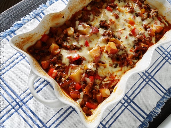 A close up photo of a sweet Italian sausage, pepper and potato bake.