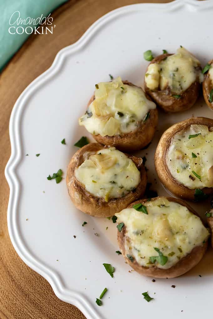 cheese stuffed mushrooms with parsley and onion