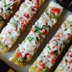 An overhead photo of mozzarella provolone bruschetta.