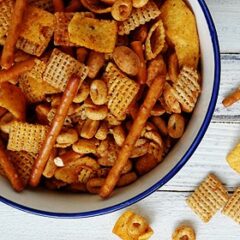 A close up overhead photo of a bowl of taco chex mix.