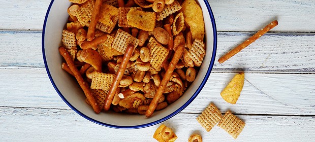 A close up overhead photo of a bowl of taco chex mix.