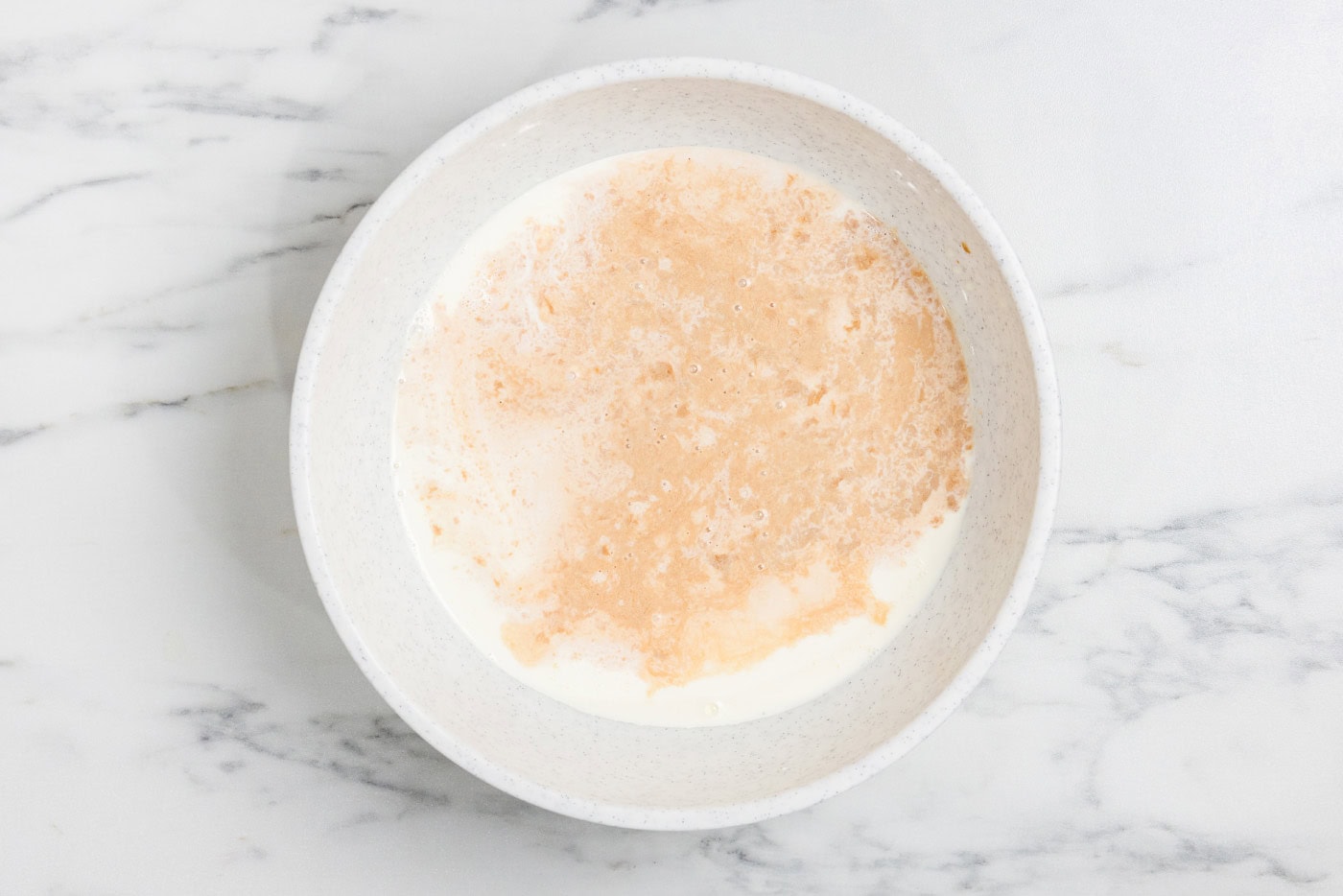 liquid ingredients in bowl for making ice cream