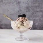 dish of jam ice cream with a spoon