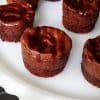 Mocha Hazelnut Mini Cheesecakes with Brownie Crust featured
