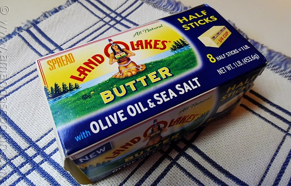 A close up photo of a package of land o lakes butter with olive oil and sea salt.