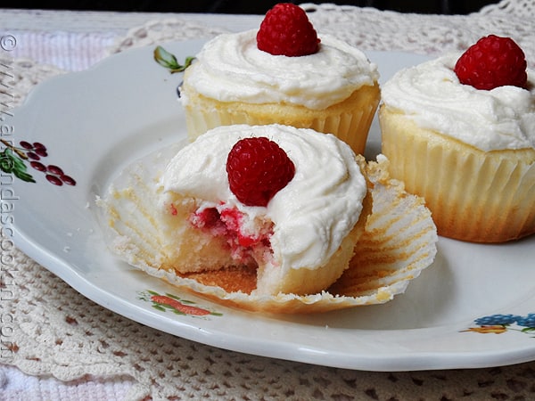 Raspberry Filled White Chocolate Buttercream Cupcakes