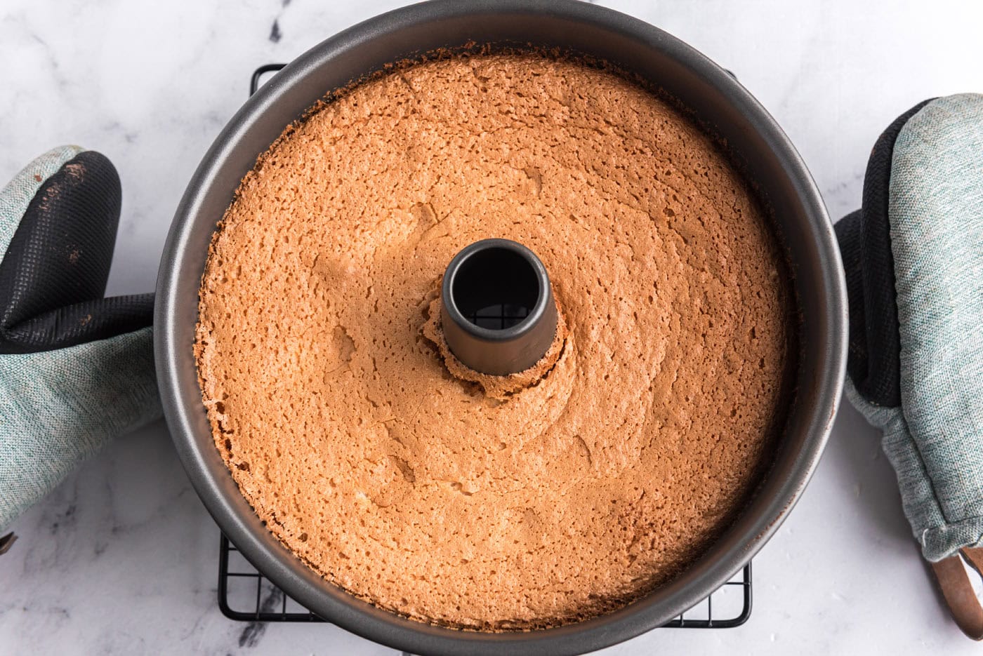 baked angel food cake in a tube pan