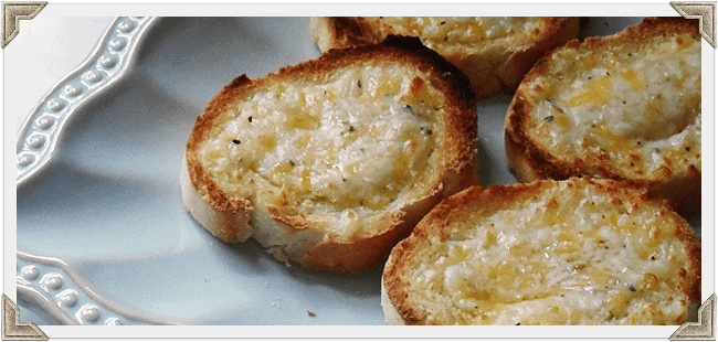 A close up photo of garlic bread.