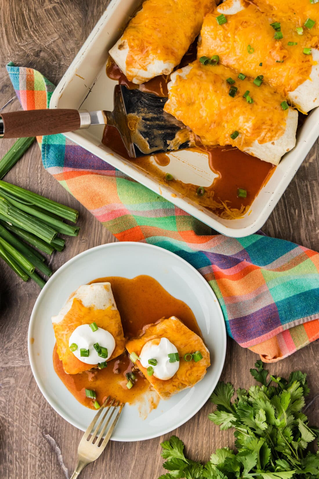Taco Bell Enchirito copycat cut oven on a plate with pan in background