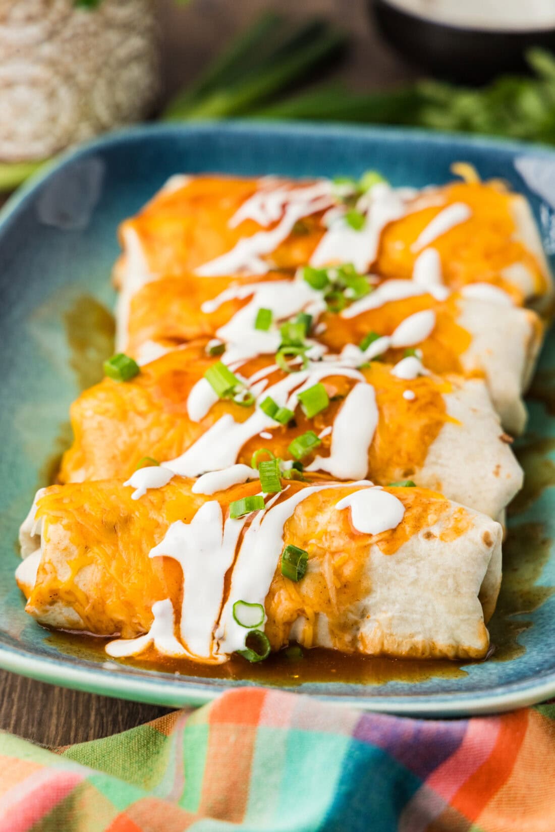 A close up photo of copycat Taco Bell enchiritos resting on a platter.