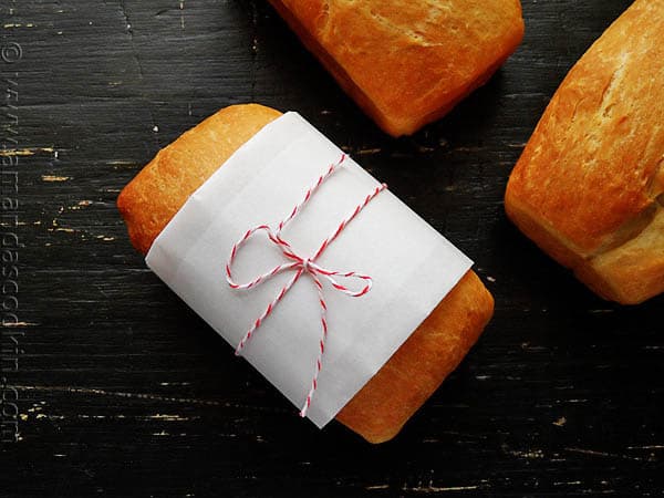 A photo of a wrapped Amish white bread mini loaf.