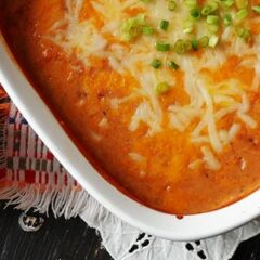 A close up overhead photo of creamy con queso bean dip.