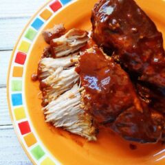 An overhead photo of slow cooker barbecued country style ribs on a plate.