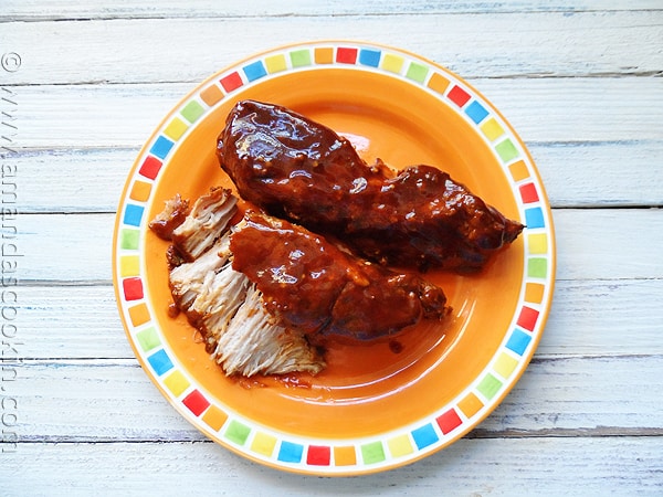 A overhead photo of slow cooker barbecued country style ribs on a plate.