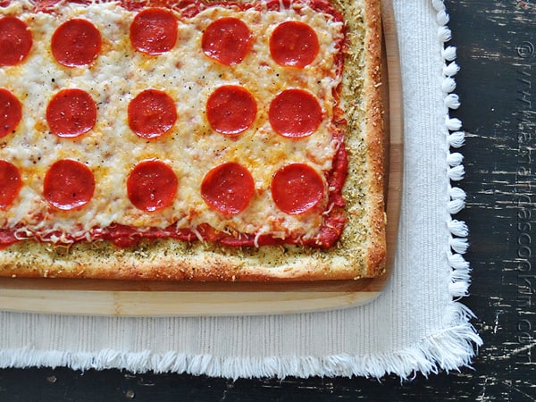 An overhead photo of garlic bread crusted classic pizza.