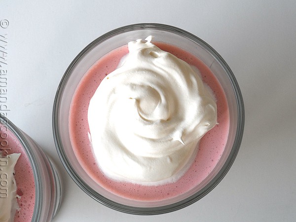 An overhead photo of a creamy raspberry Jell-O parfaits.
