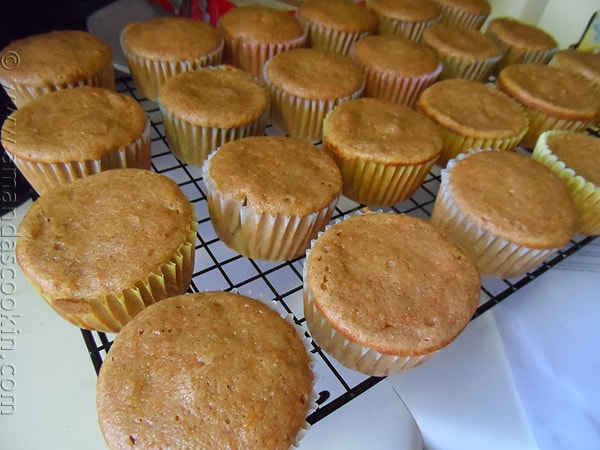 A close up photo of time saver carrot cupcakes without frosting on a cooling rack.