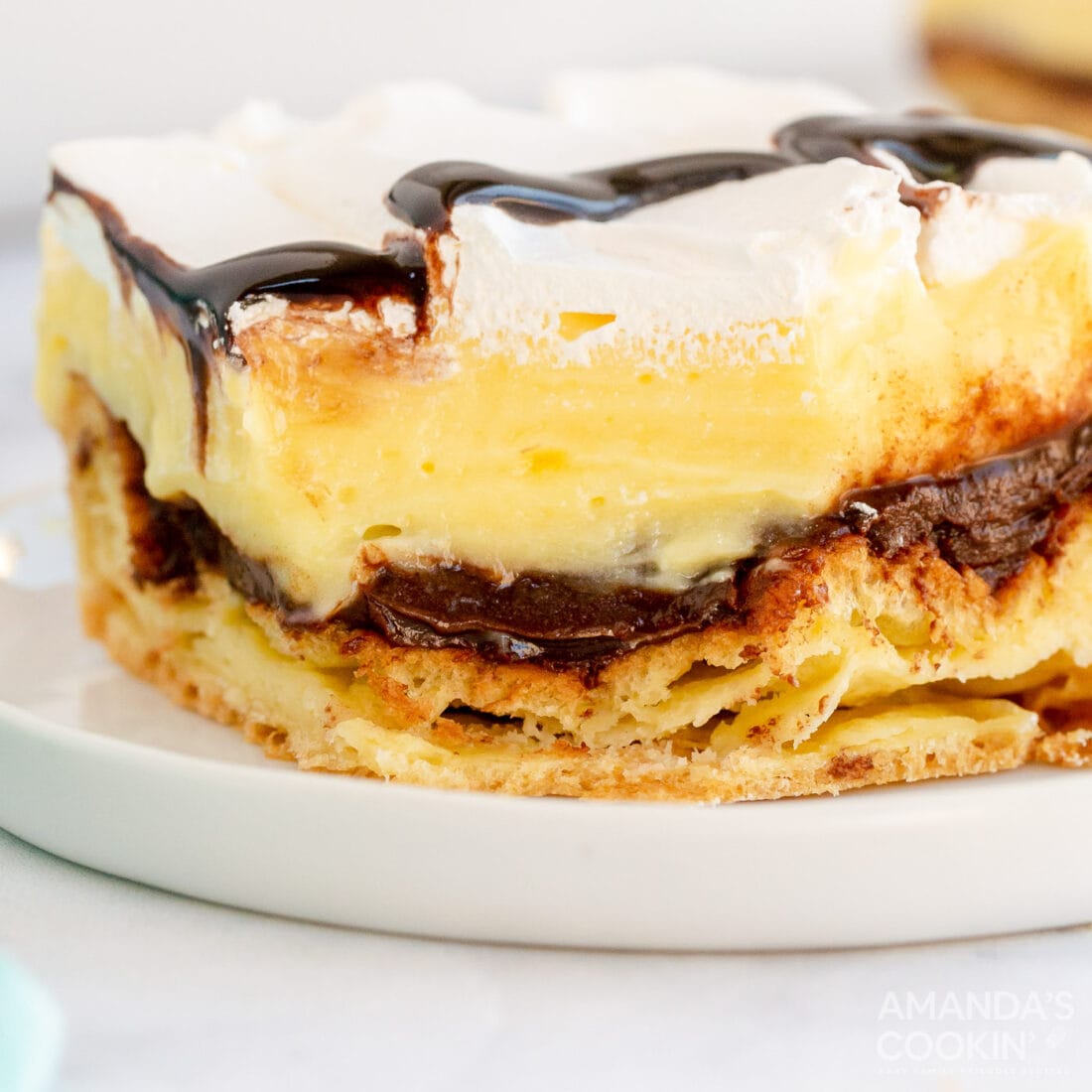 Cream Puff Chocolate Eclair Cake - Amanda's Cookin' - Cake & Cupcakes