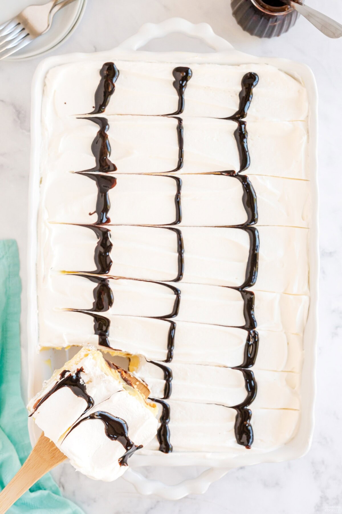 over head view of pan of Cream Puff Chocolate Eclair Cake