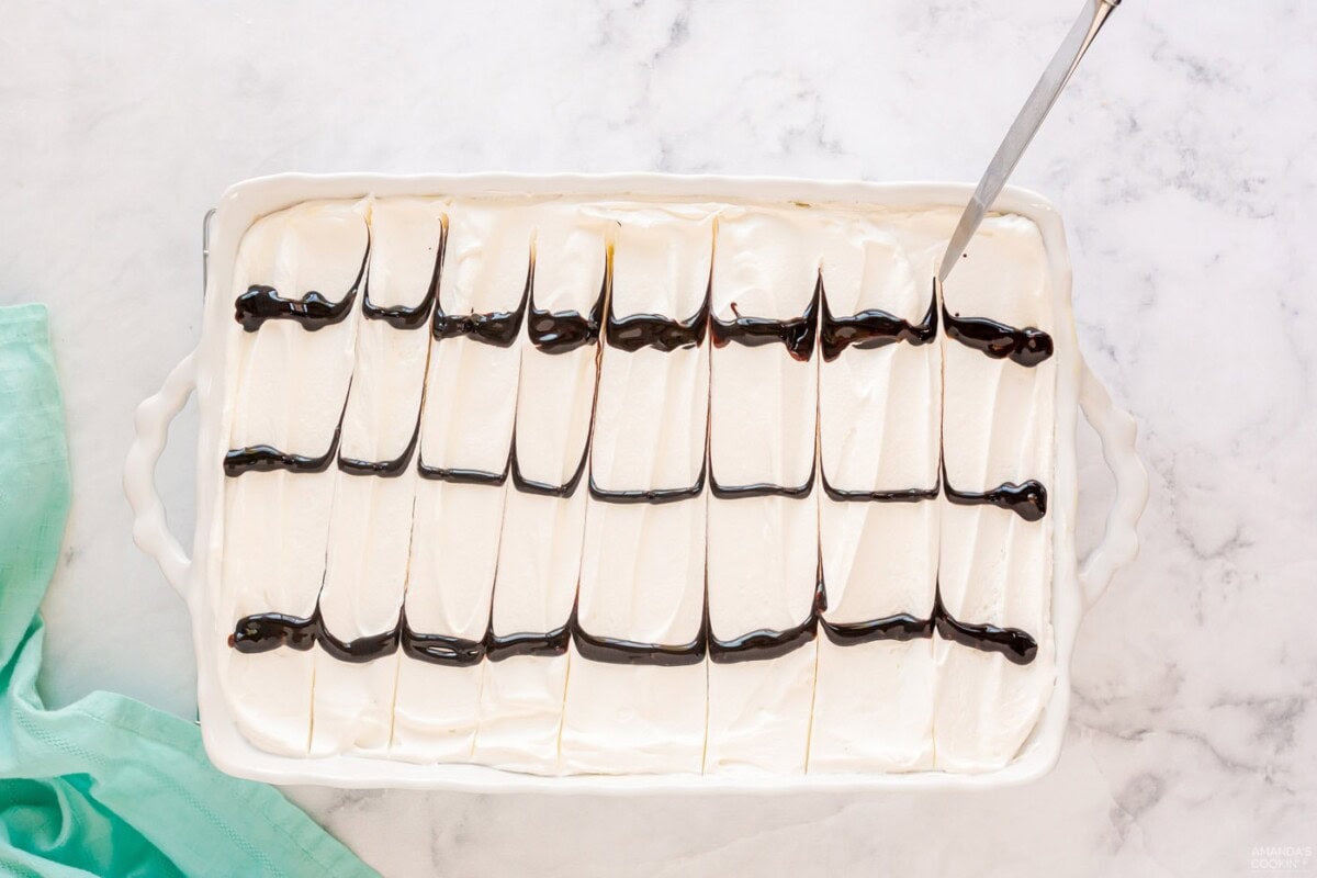 using a knife to drag chocolate lines
