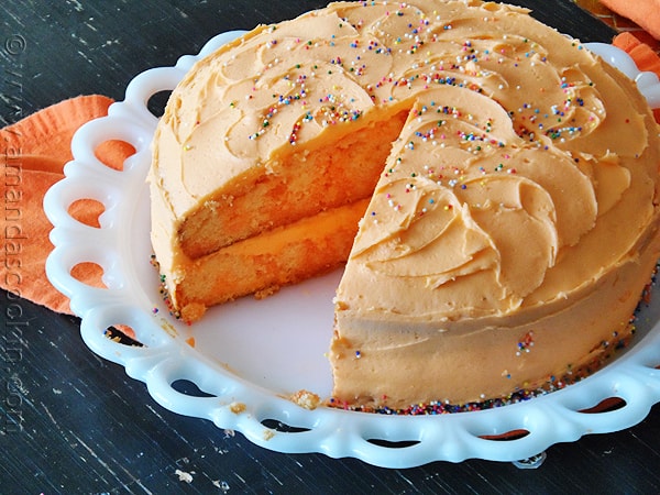 Orange Poke Cake from AmandasCookin.com @amandaformaro