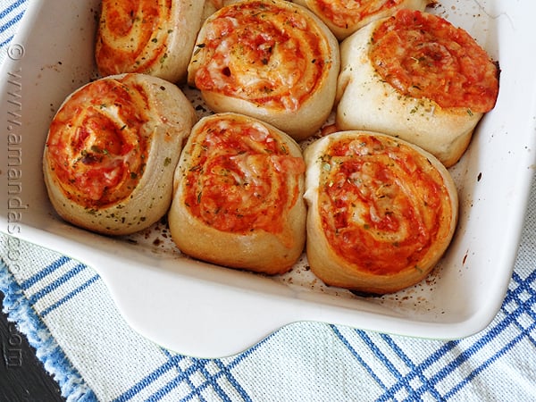 A close up photo of pizza roll ups.