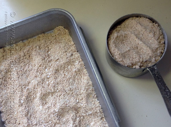 An overhead photo of breading mixture in a shallow pan.