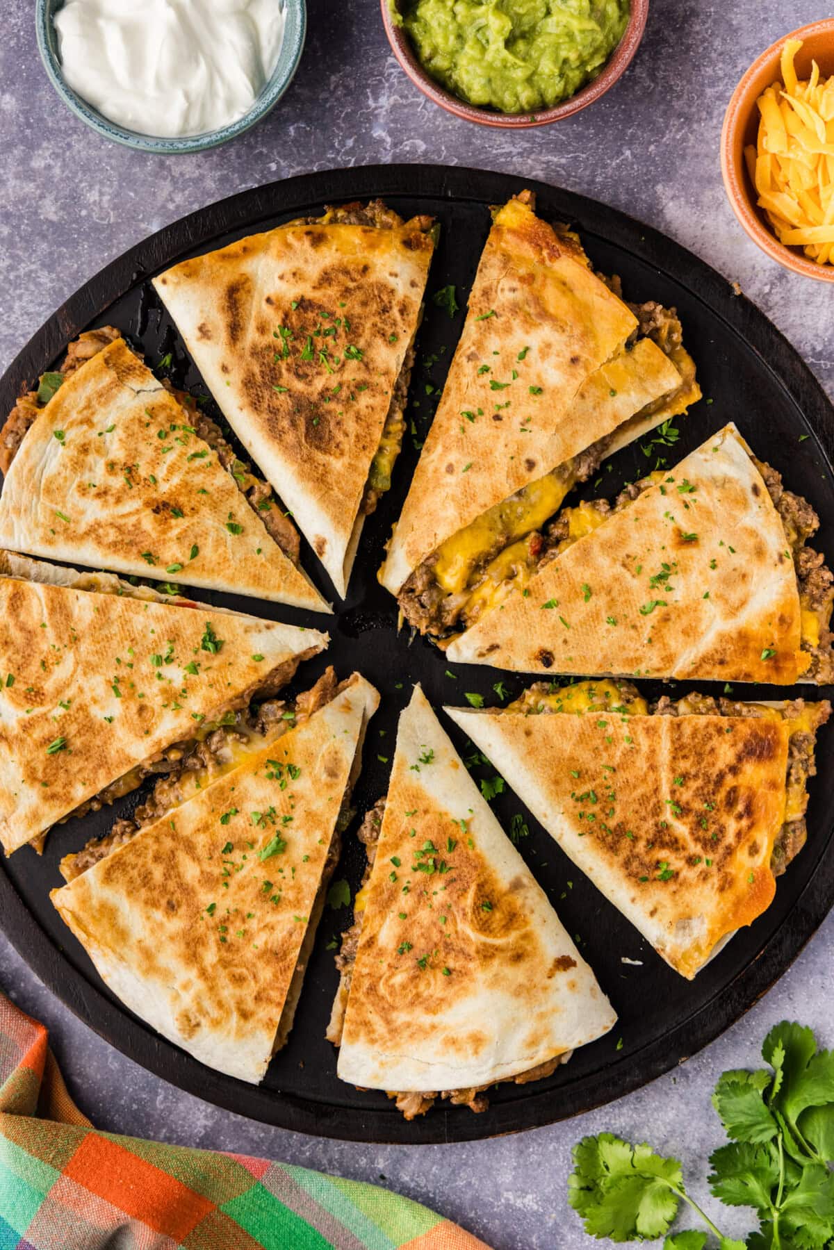 overhead of triangles of Beef and Bean Quesadillas