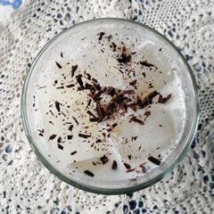 An overhead photo of an Olive Garden Italian cream soda with chocolate shavings on top.