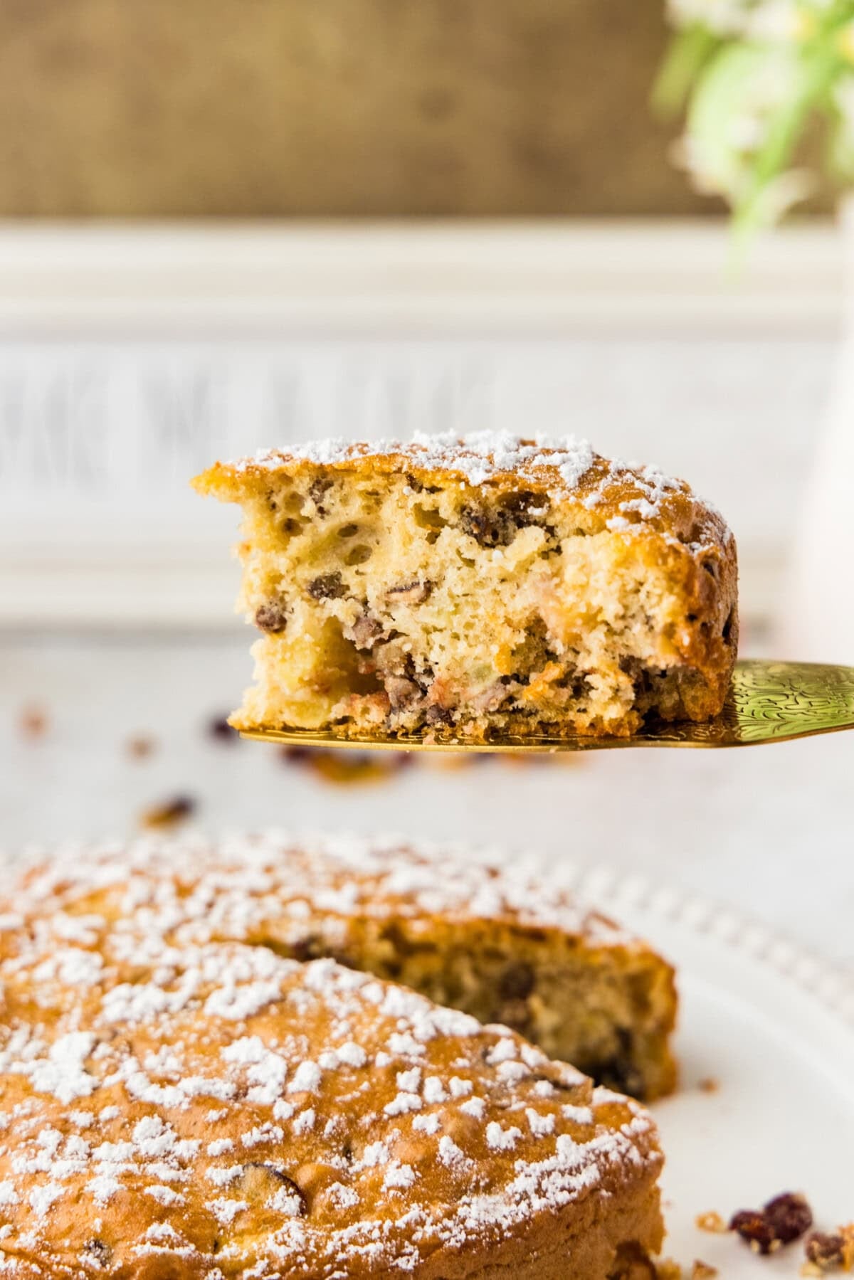 spatula lifting a slice of Merryfield Apple Cake