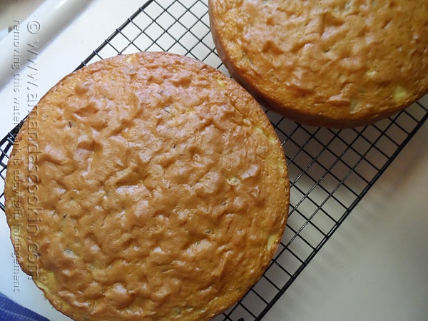 An overhead photo of two Merryfield apple cakes on a cooling rack.