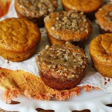 A close up photo of pumpkin mini cakes with cinnamon streusel topping.